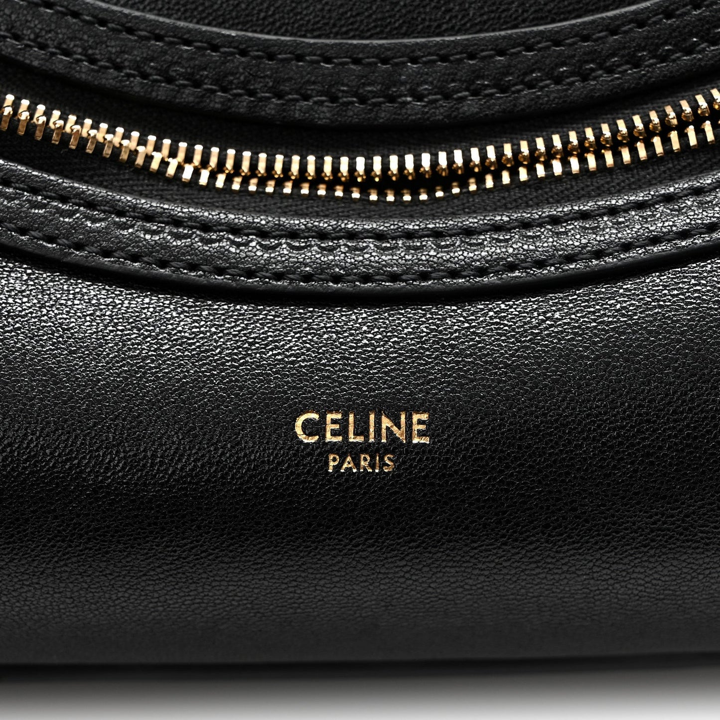 Celine black leather front pocket with gold zipper and CELINE PARIS logo