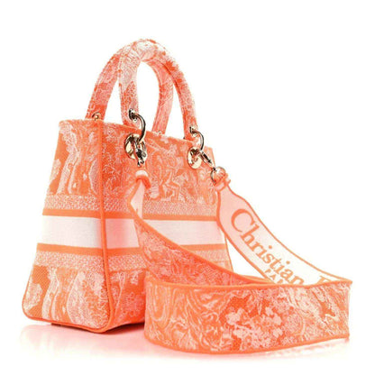 Orange toile de Jouy embroidered Lady D-Lite bag with handles and wide logo strap.
