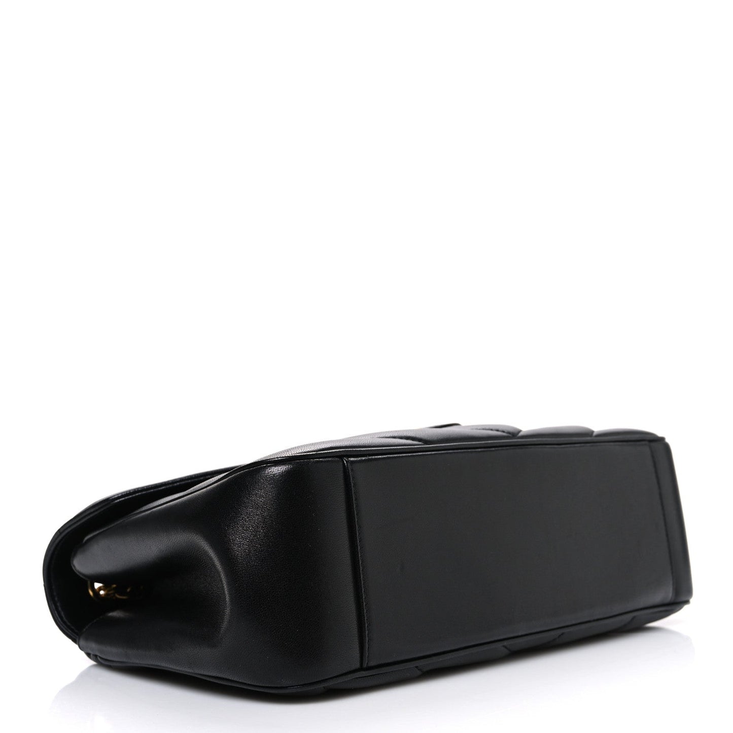 Black quilted shoulder bag with curved top handle and smooth side profile