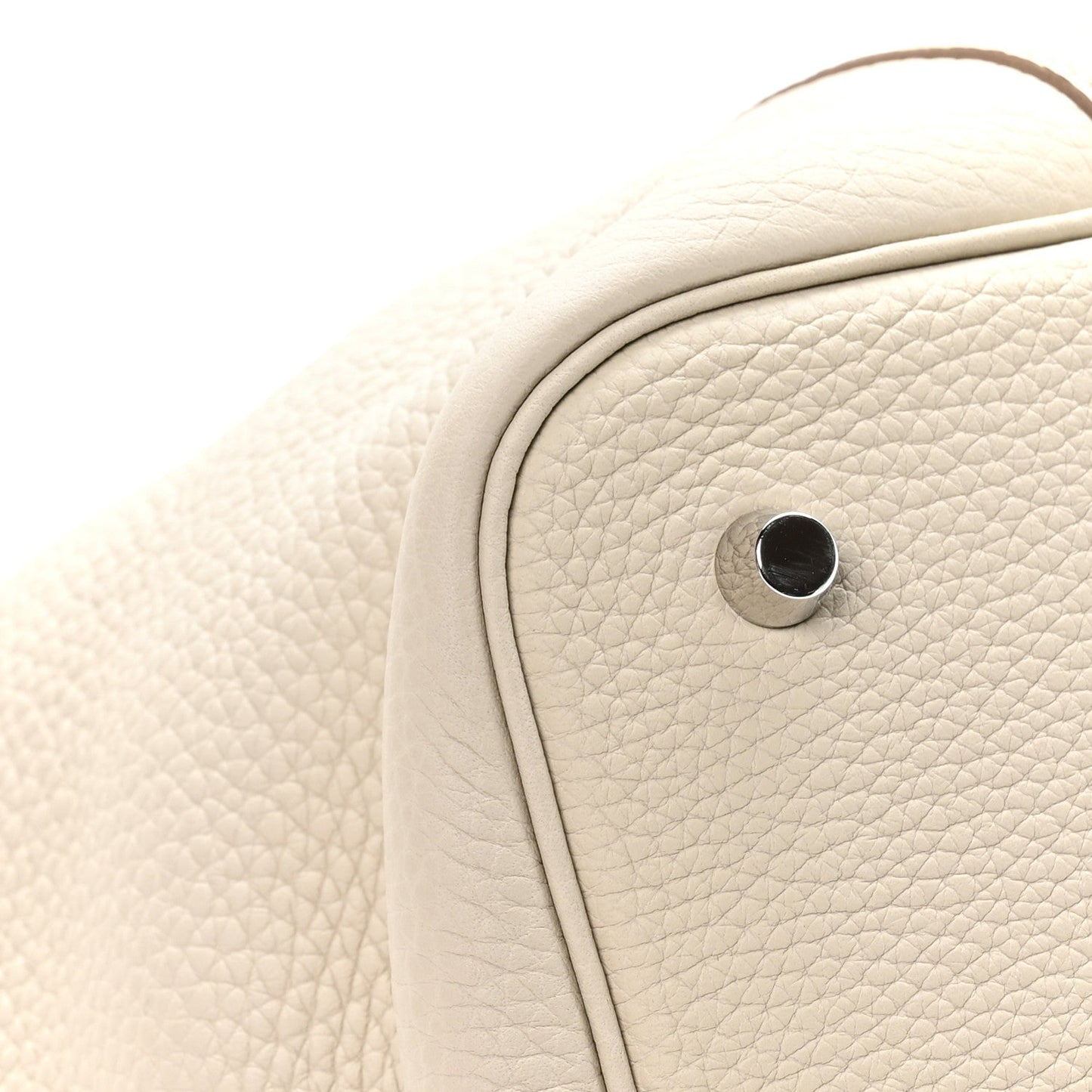 Ivory leather tote bag corner with round metal snap