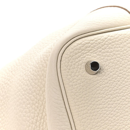 Ivory leather tote bag corner with round metal snap