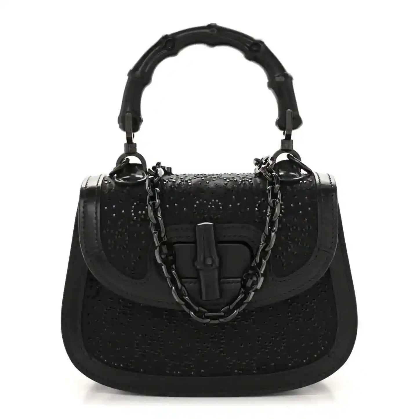 Black mini handbag with bamboo-style top handle and chain strap, textured with rhinestone sheen.