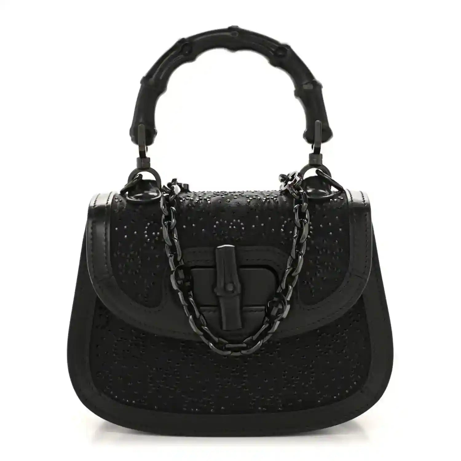 Black mini handbag with bamboo-style top handle and chain strap, textured with rhinestone sheen.