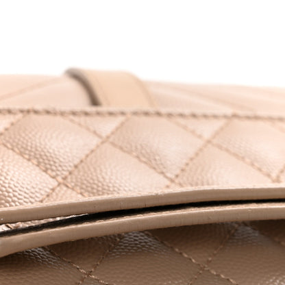 Dark beige quilted satchel strap top edge with neat stitching