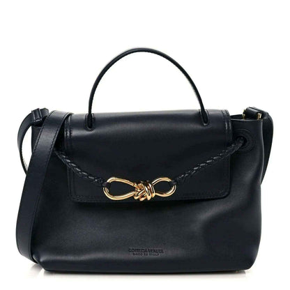 Black small handbag in silky calfskin with top handle and gold-tone chain clasp