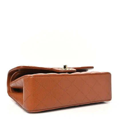 Chanel small double flap bag underside in caramel quilted leather with metal clasp