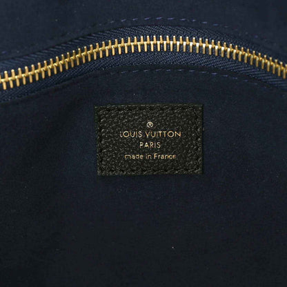 Louis Vuitton Paris made in France leather bag label with gold zipper trim