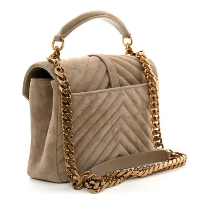 Taupe suede quilted shoulder bag with chevron stitching and gold chain strap