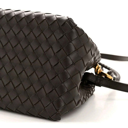 Black intrecciato leather shoulder bag corner with black strap detail