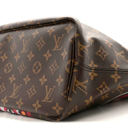 Brown monogram corner with smooth leather trim and stitched edge detail