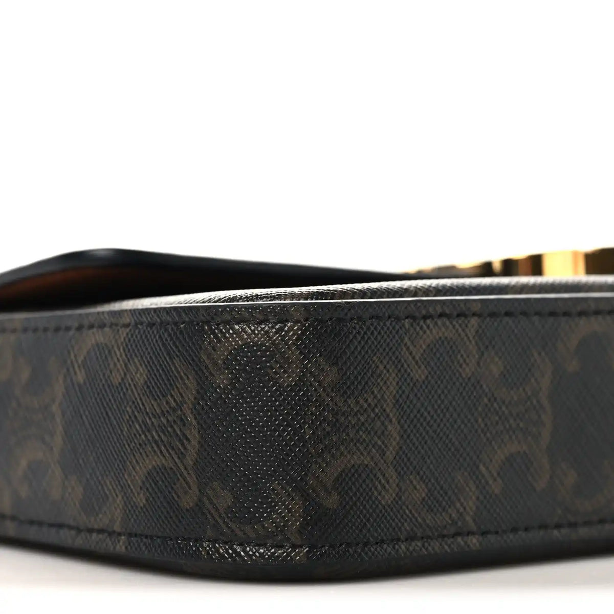 Celine canvas shoulder bag side profile with dark monogram texture