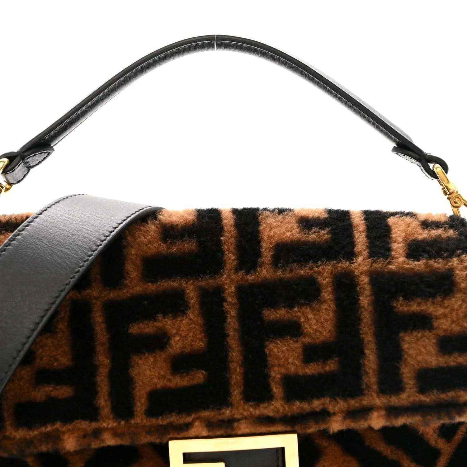 Black leather top strap with tobacco-brown shearling front panel and FF logo.