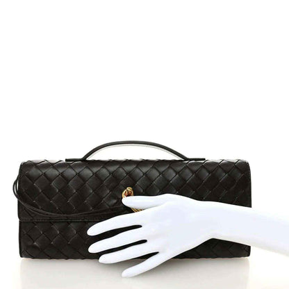 Black intrecciato nappa top-handle clutch with gold clasp and flap front