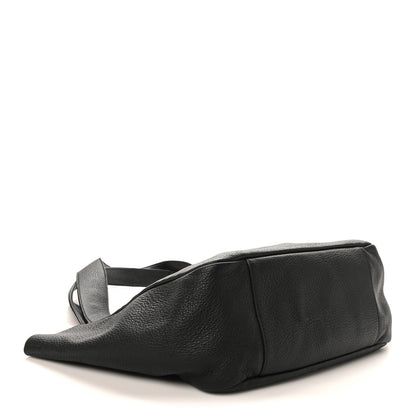 SAINT LAURENT Bea tote bag laid flat in black grained deerskin leather with strap