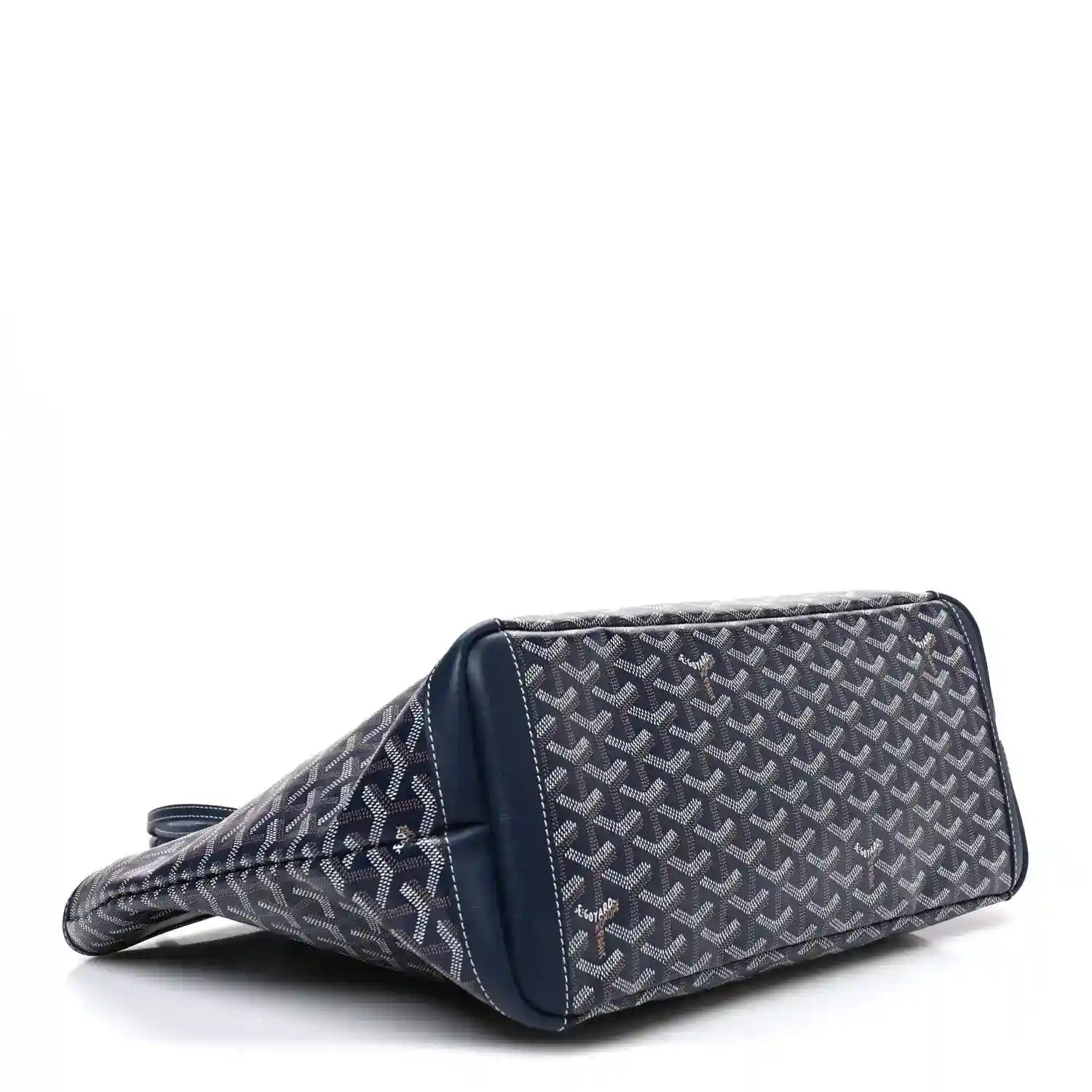 Navy Goyardine Artois MM tote bag angled side view with stitched edges