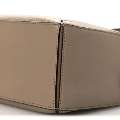 Small Puzzle bag side panel seam, grained sand calfskin with dark trim