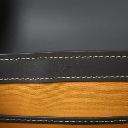 Black leather lining with contrast white stitching along the interior edge