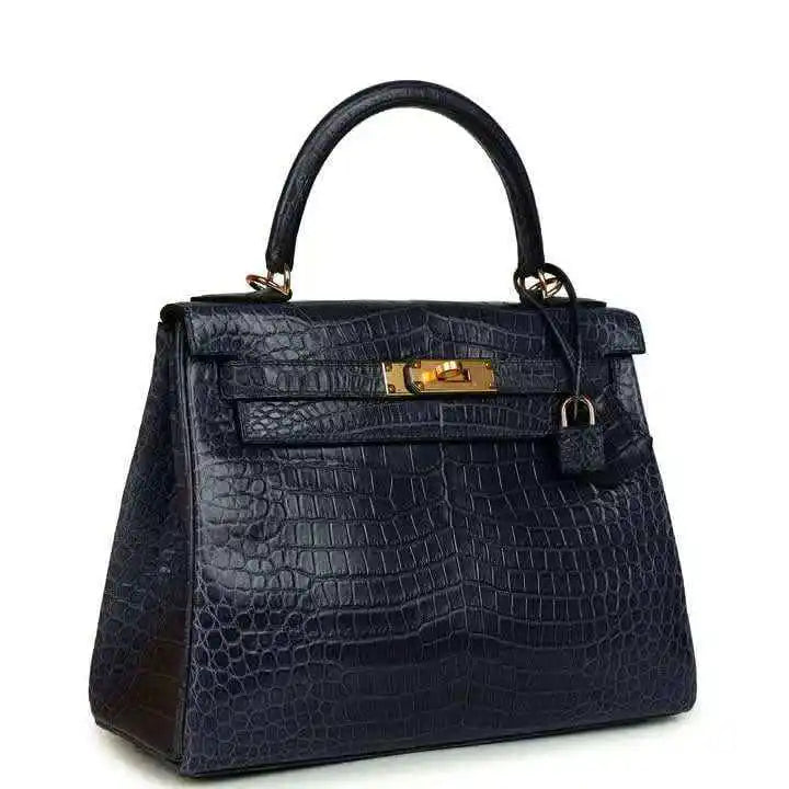 Hermès Kelly Retourne 28 top-handle bag, matte croc-embossed dark blue, gold-tone clasp