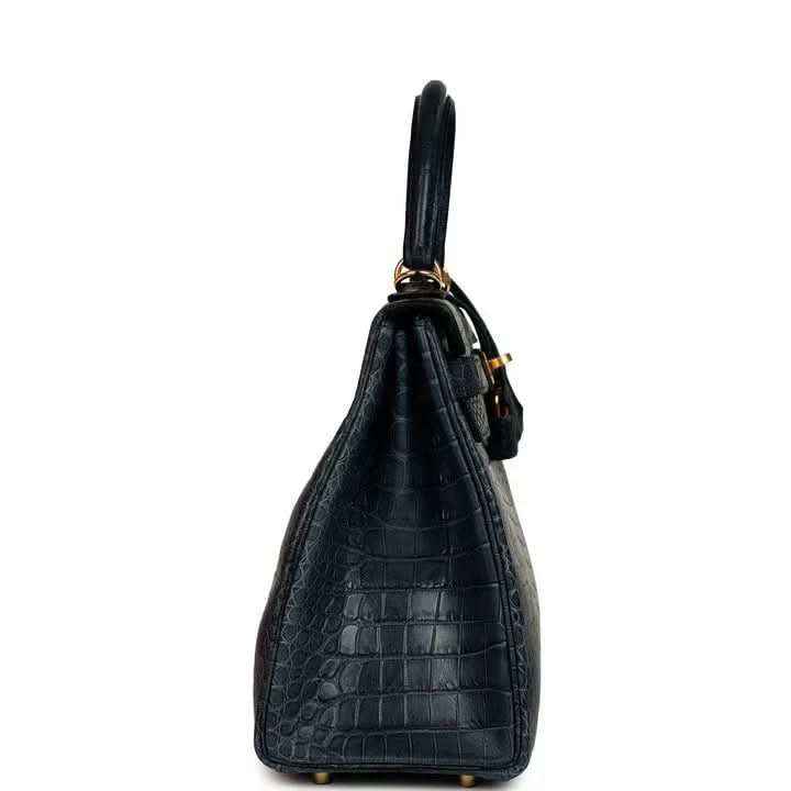Hermès Kelly Retourne 28 top-handle bag, matte croc-embossed dark blue, gold hardware