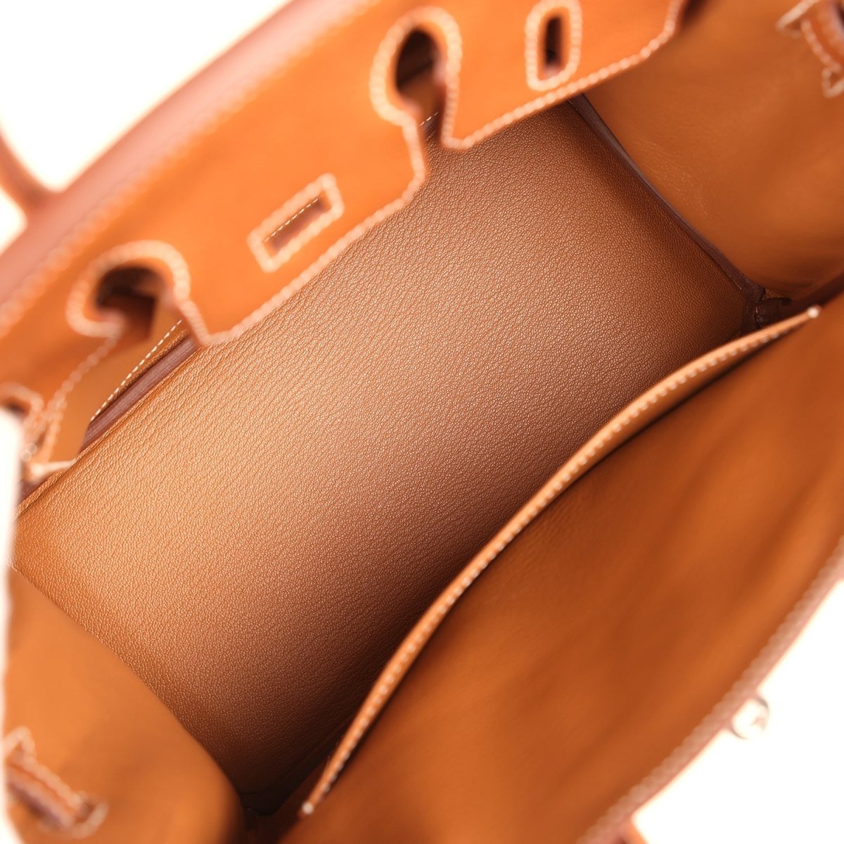 Hermes Birkin 25 handbag interior view with tan leather lining and visible stitching
