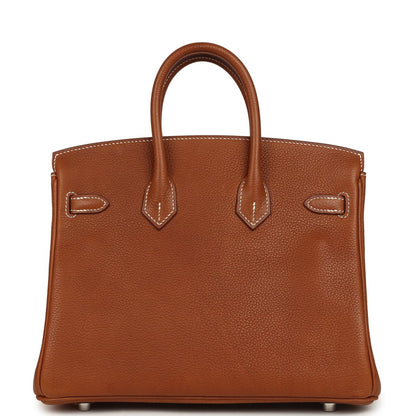 Hermes Birkin 25 leather handbag front view in tan with stitched straps and bottom feet