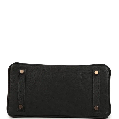 Black leather interior pocket with snap and four corner rivets