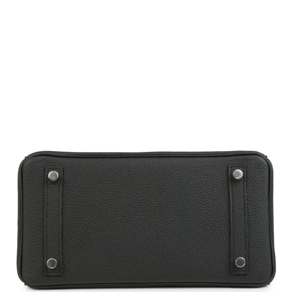 Black rectangular leather handbag front panel with snap posts and top stitching.