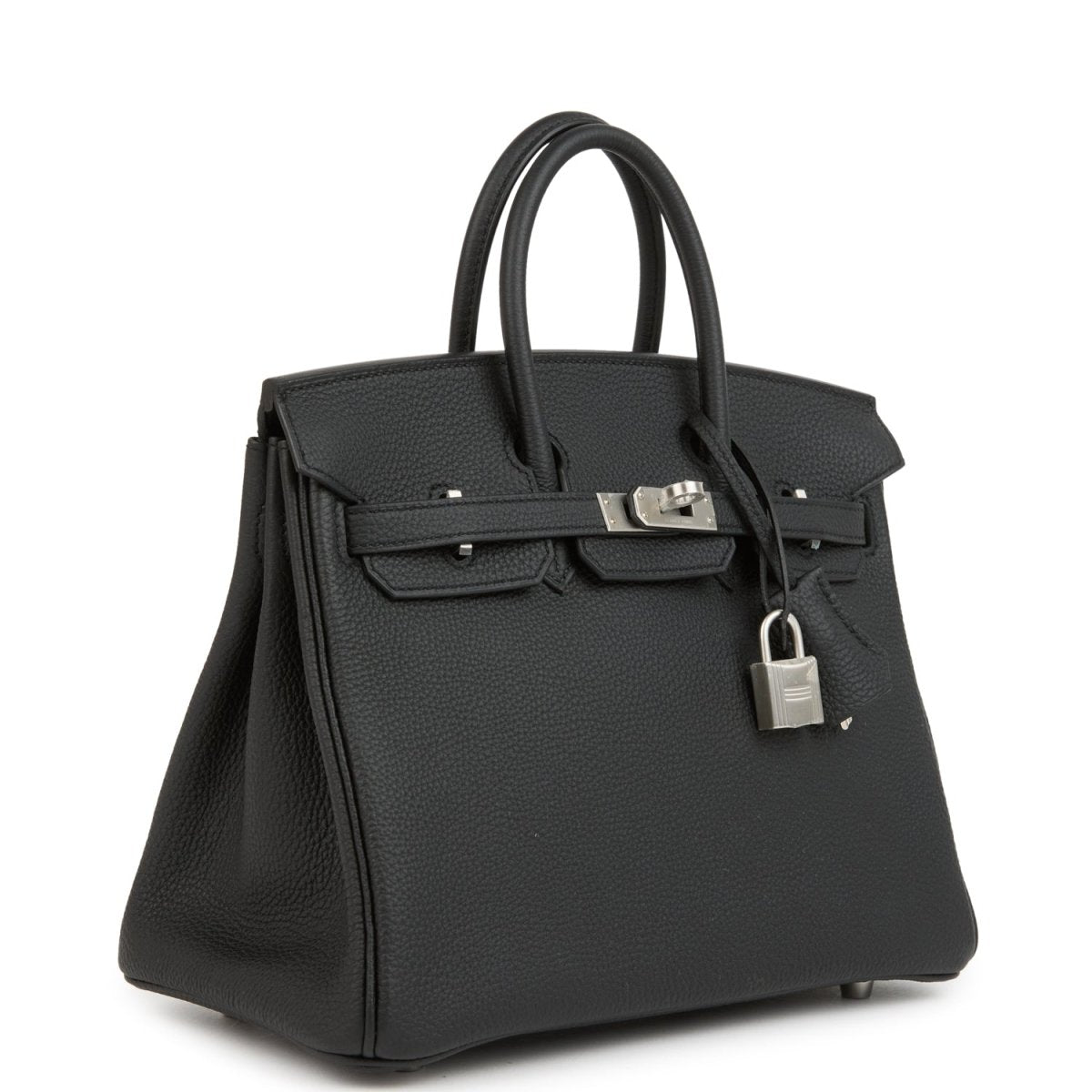 Black leather handbag with structured top handles, front flap, and brushed palladium clasp.
