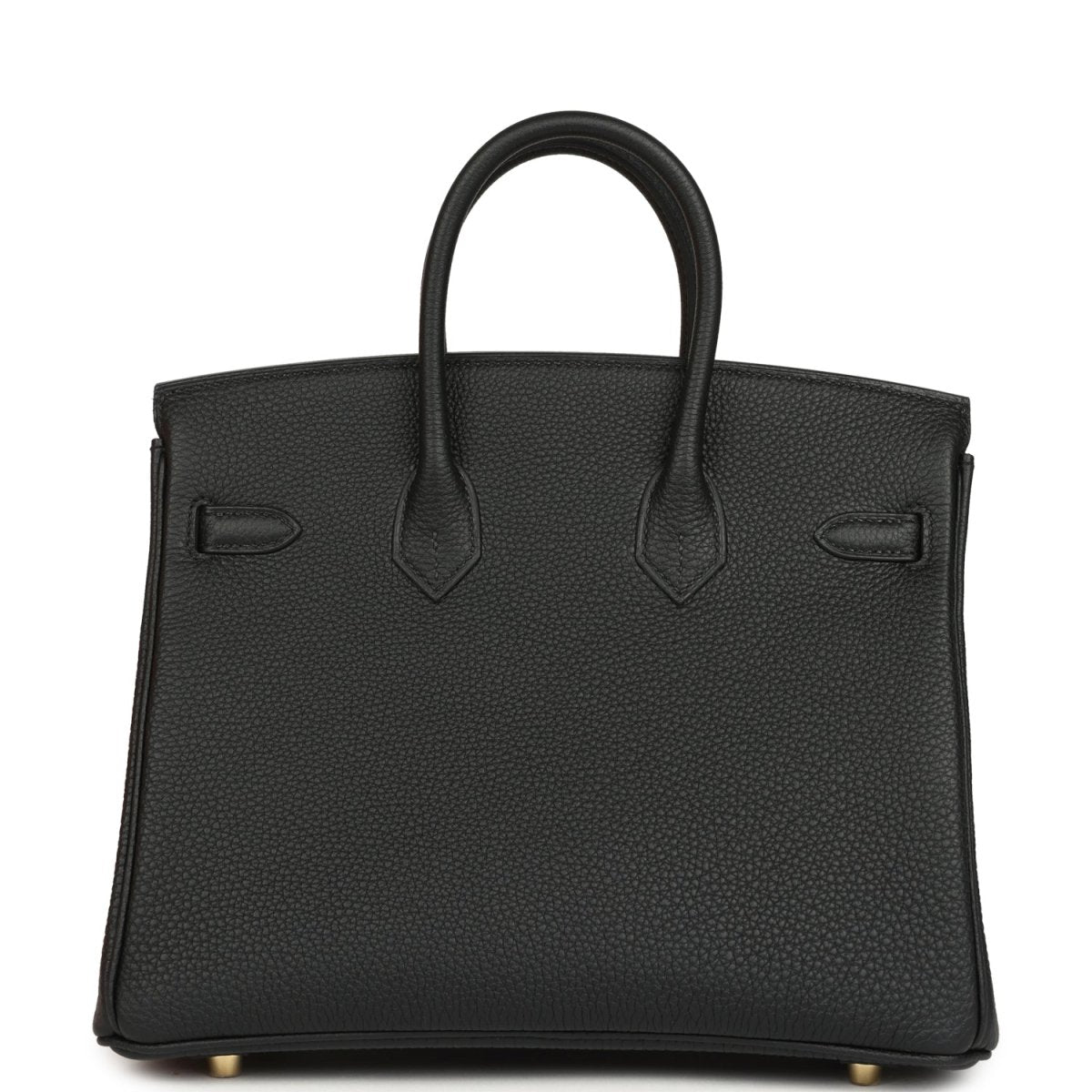 Black leather handbag back view with embossed panels and top handles