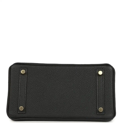 Black leather handbag base with four gold-toned studs and curved corners