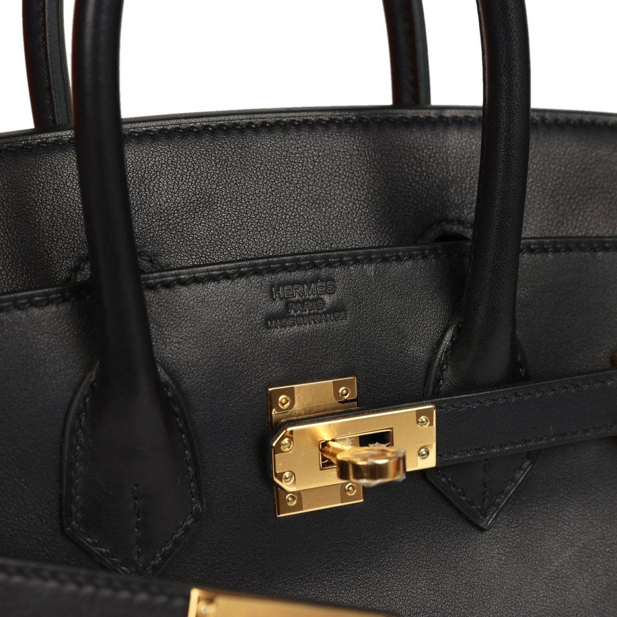 Black leather Birkin 25 interior with Hermes logo and gold front clasp detail