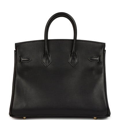 Black leather Birkin 25 handbag with front patch pockets and structured shape