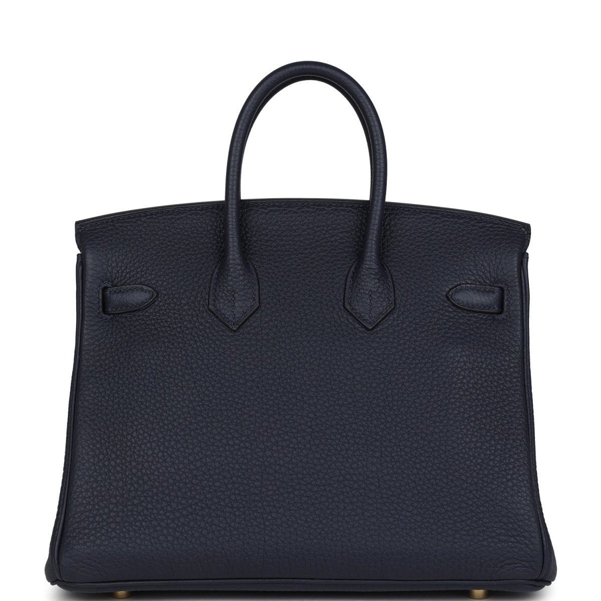 Hermes Birkin 25 handbag in dark blue leather with stitched panels and top handles.
