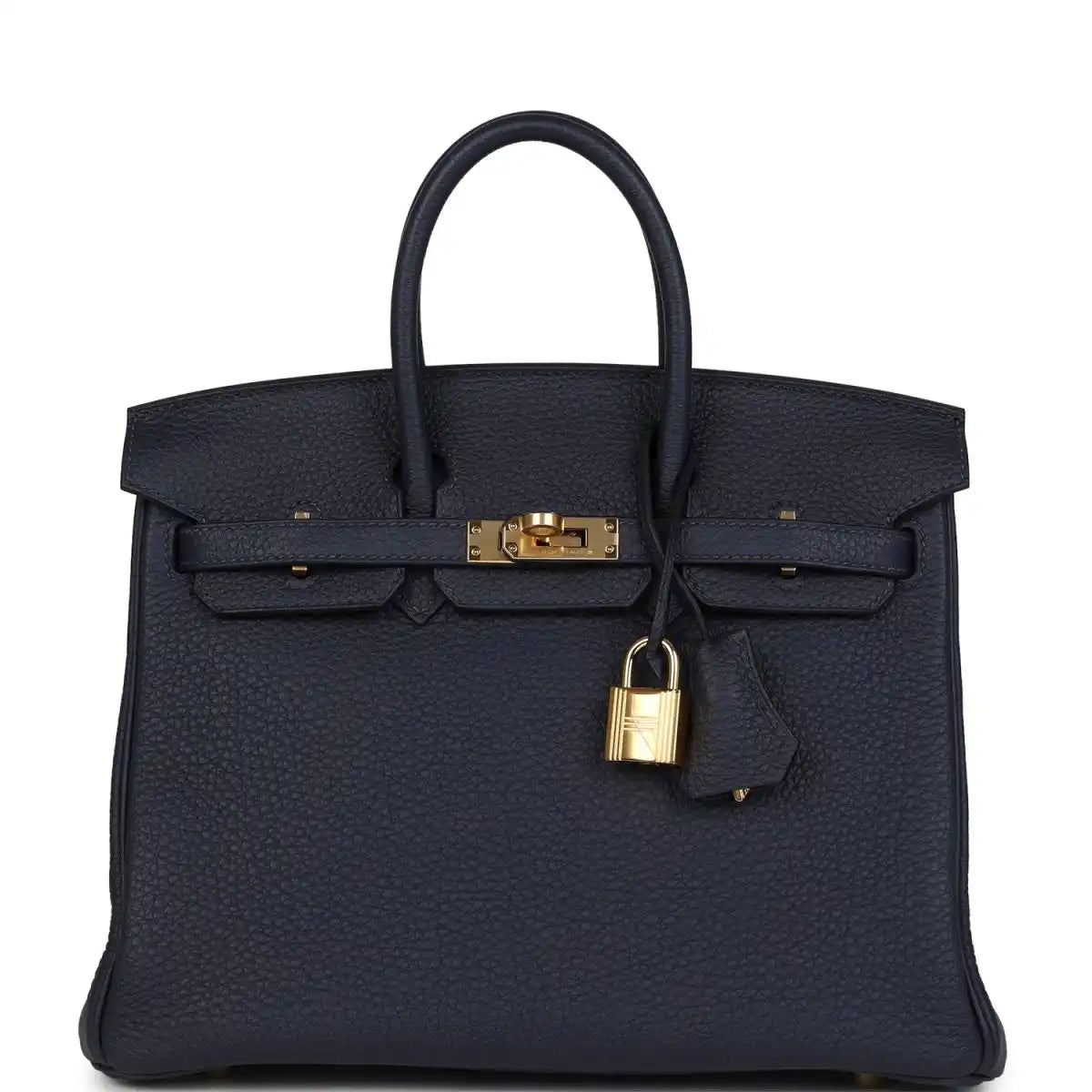 Hermes Birkin 25 handbag in dark blue Togo leather with gold hardware and top handles.