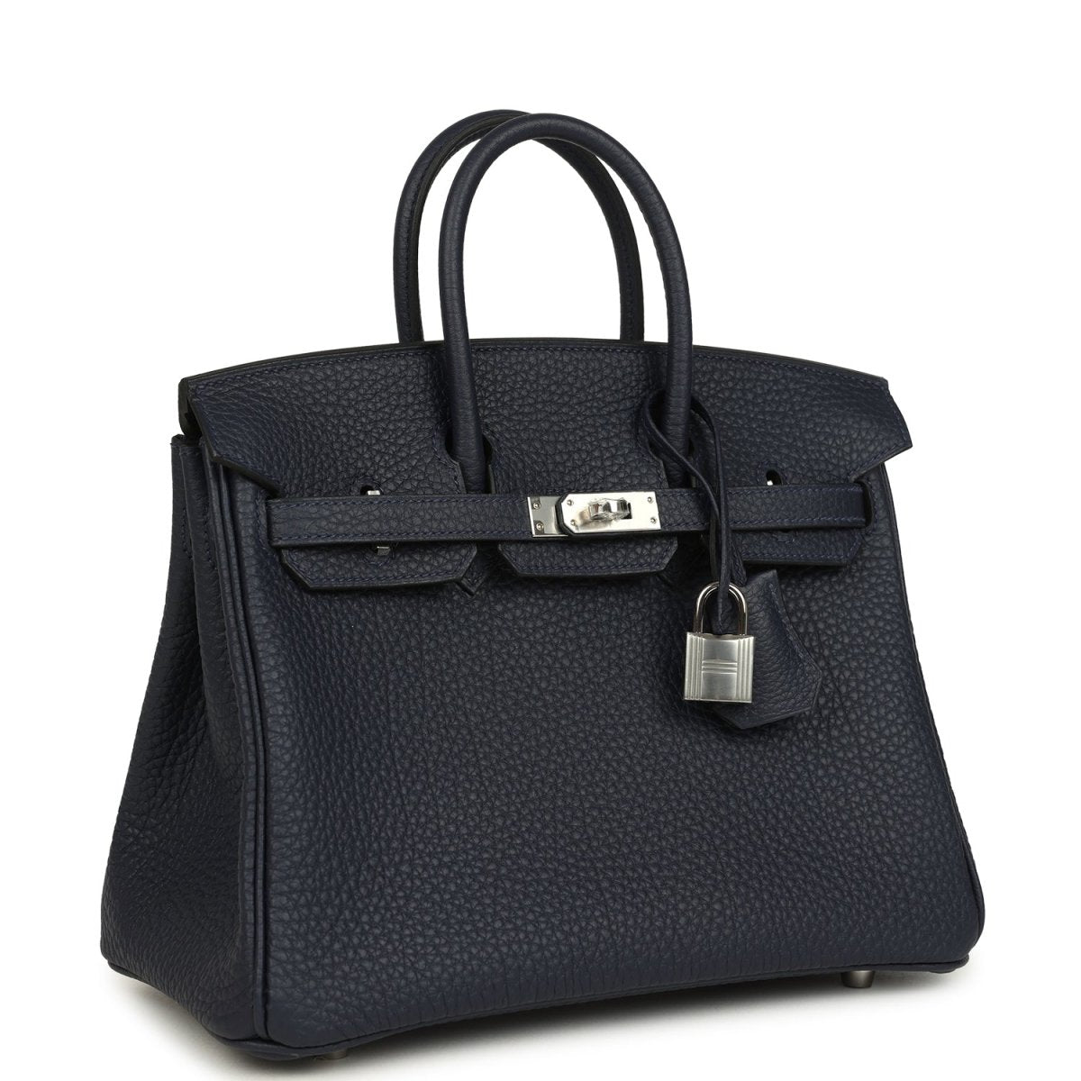 Birkin 25 handbag three-quarter view in dark blue pebbled leather with front lock