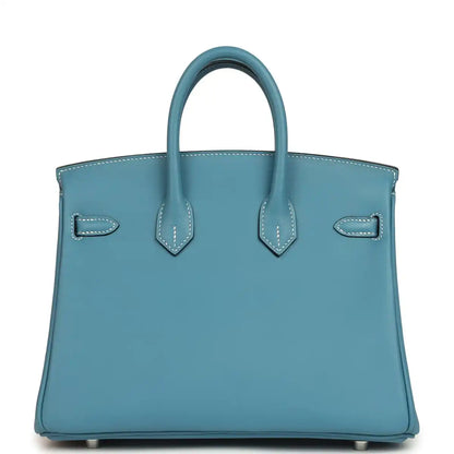 Blue Birkin 25 handbag back panel with two handles and stitched tab details