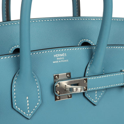 Blue Birkin 25 handbag interior with stitched seams and logo embroidery