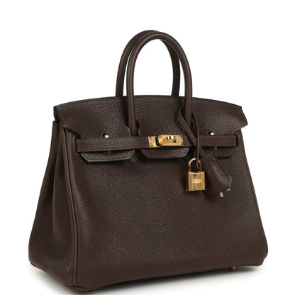 Brown leather handbag with top handles, front flap and gold-tone lock