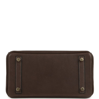Brown leather rectangular clutch bag with snap ends and gold-tone studs