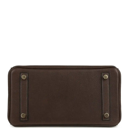 Brown leather rectangular clutch bag with snap ends and gold-tone studs