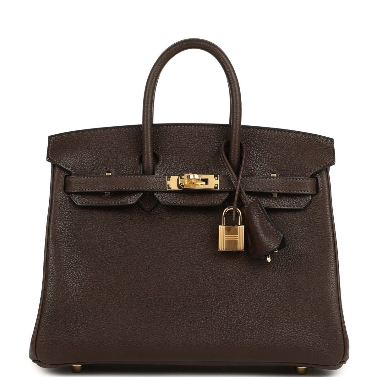 Brown leather handbag with top handles, front flap and hanging gold lock