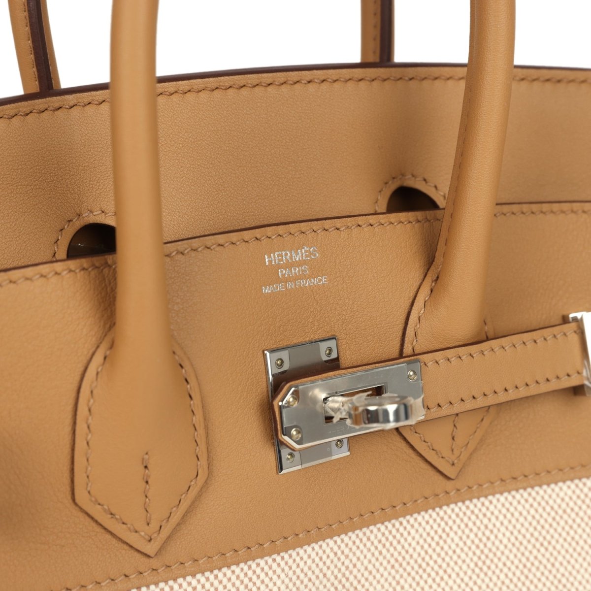 Birkin 25 handbag interior with Hermes stamp, turn-lock plate, stitched pockets