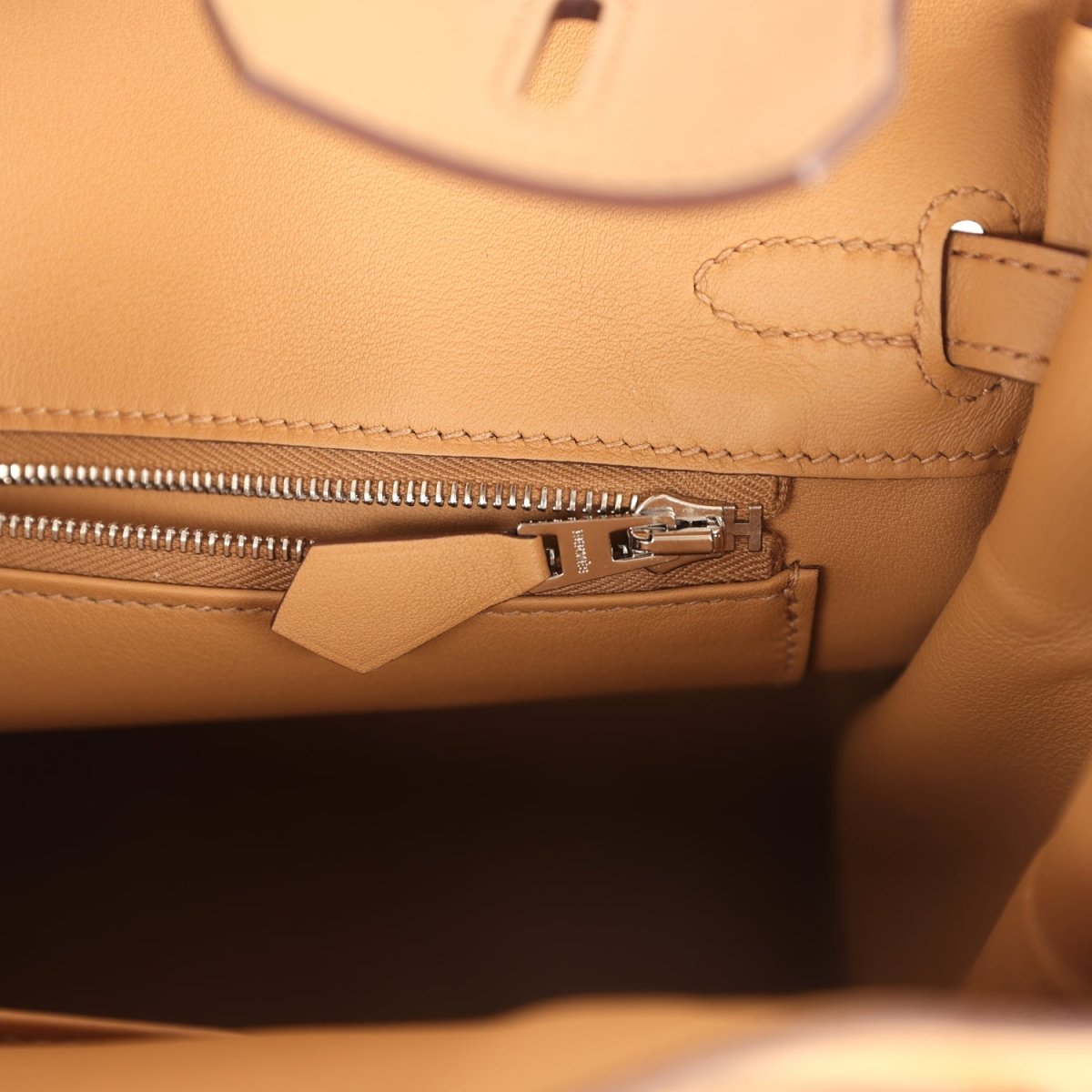 Birkin 25 handbag with leather zipper pocket and silver-toned zipper pull