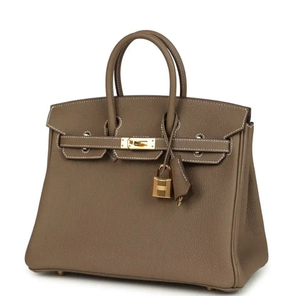 Hermès Birkin 25 handbag 3/4 view with front pocket panels and gold center clasp