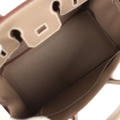 Hermes Birkin 25 handbag interior view with taupe leather lining and stitched edges