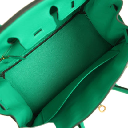 Menthe green Birkin 25 handbag interior with top opening and partition pockets