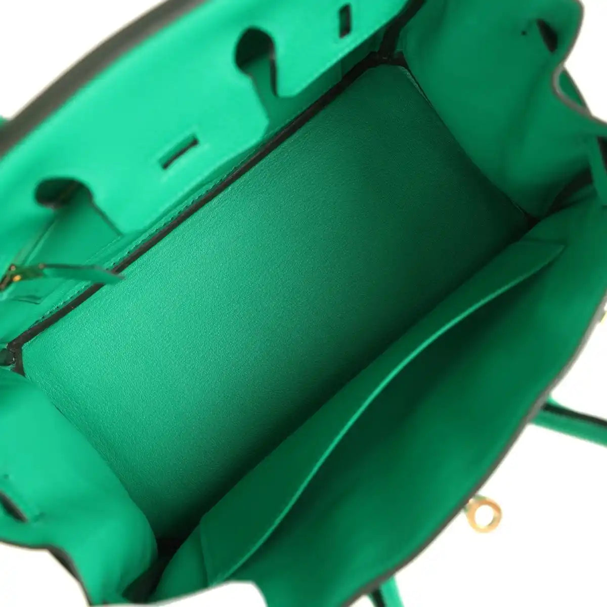 Menthe green Birkin 25 handbag interior with top opening and partition pockets