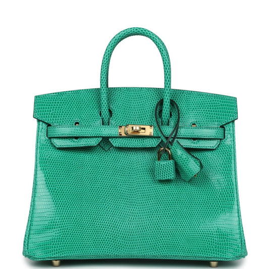 Mint green lizard handbag with gold-tone clasp and top handles