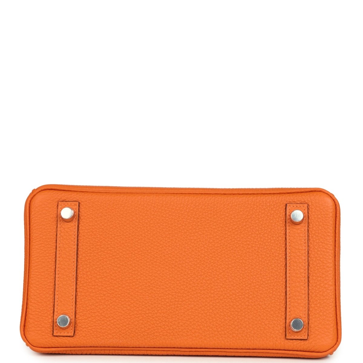 Orange leather Birkin 25 handbag base panel with four silver studs at corners