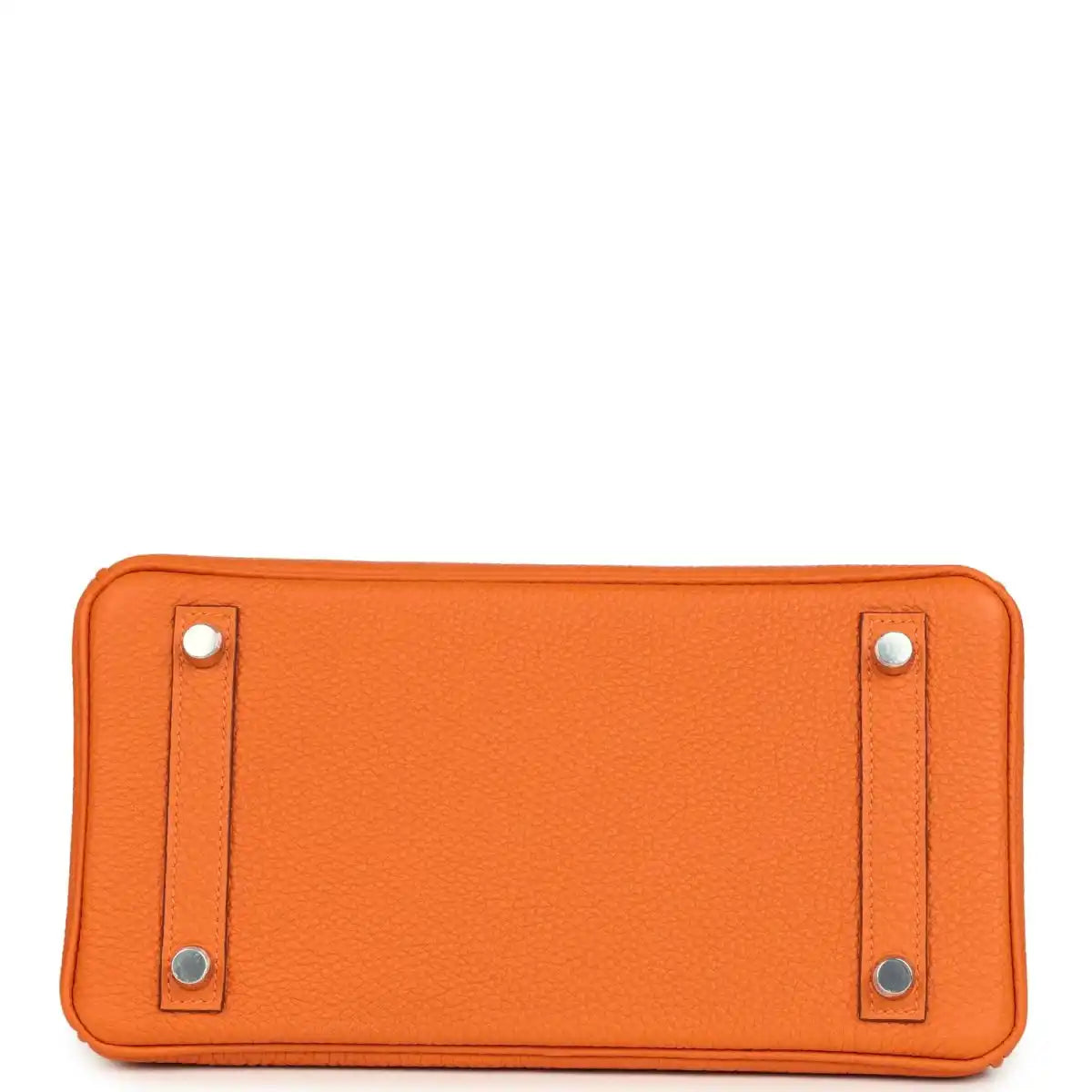 Orange leather Birkin 25 handbag base panel with four silver studs at corners